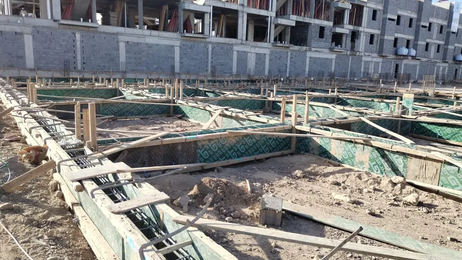 الميدة، مبنى تجاري سكني، حي شوران