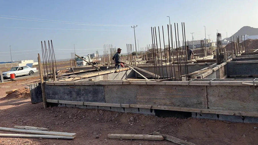 الميدة، مبنى سكني تجاري، حي وادي مذينب